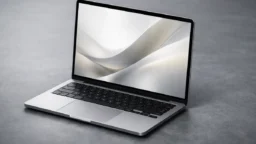 Apple MacBook Pro M5 laptop open on slate grey surface from £1,699 UK